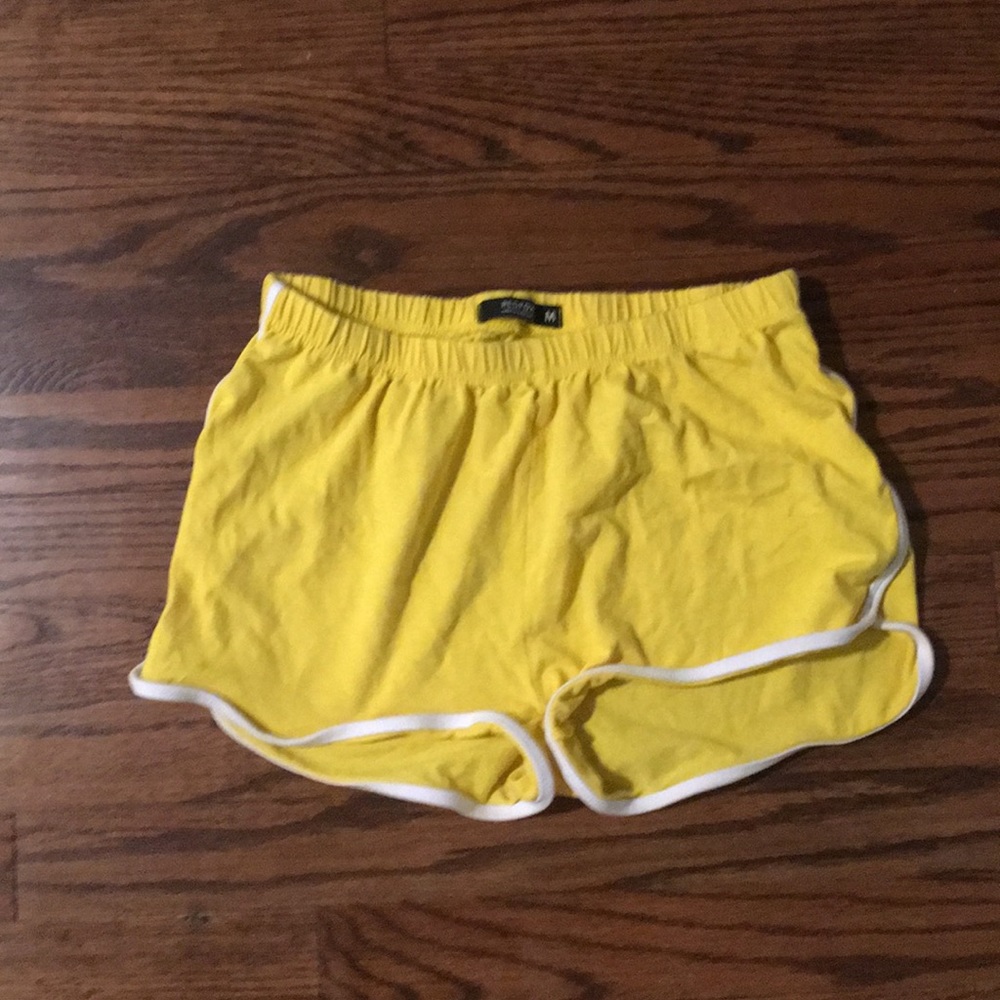cute yellow shorts with white trim!